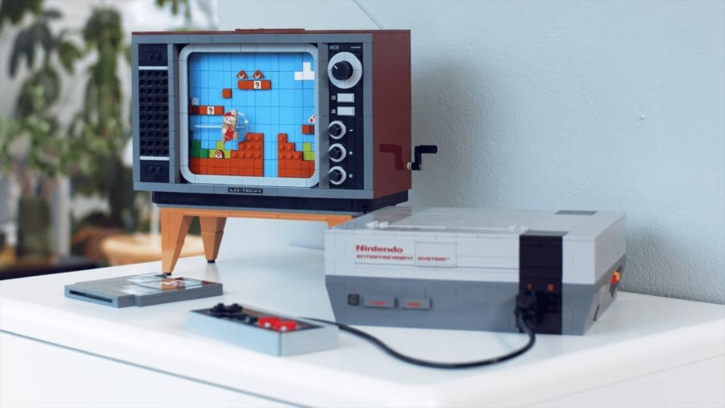 LEGO tiene un nuevo set temático de Super Mario Bros., está vez lleno de nostalgia retro con la NES y hasta un televisor de antaño. LEGO tiene un nuevo set temático de Super Mario Bros., está vez lleno de nostalgia retro con la NES y hasta un televisor de antaño.