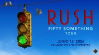 Los músicos Geddy Lee y Alex Lifeson de la banda Rush tocando sus instrumentos en vivo en un concierto de rock